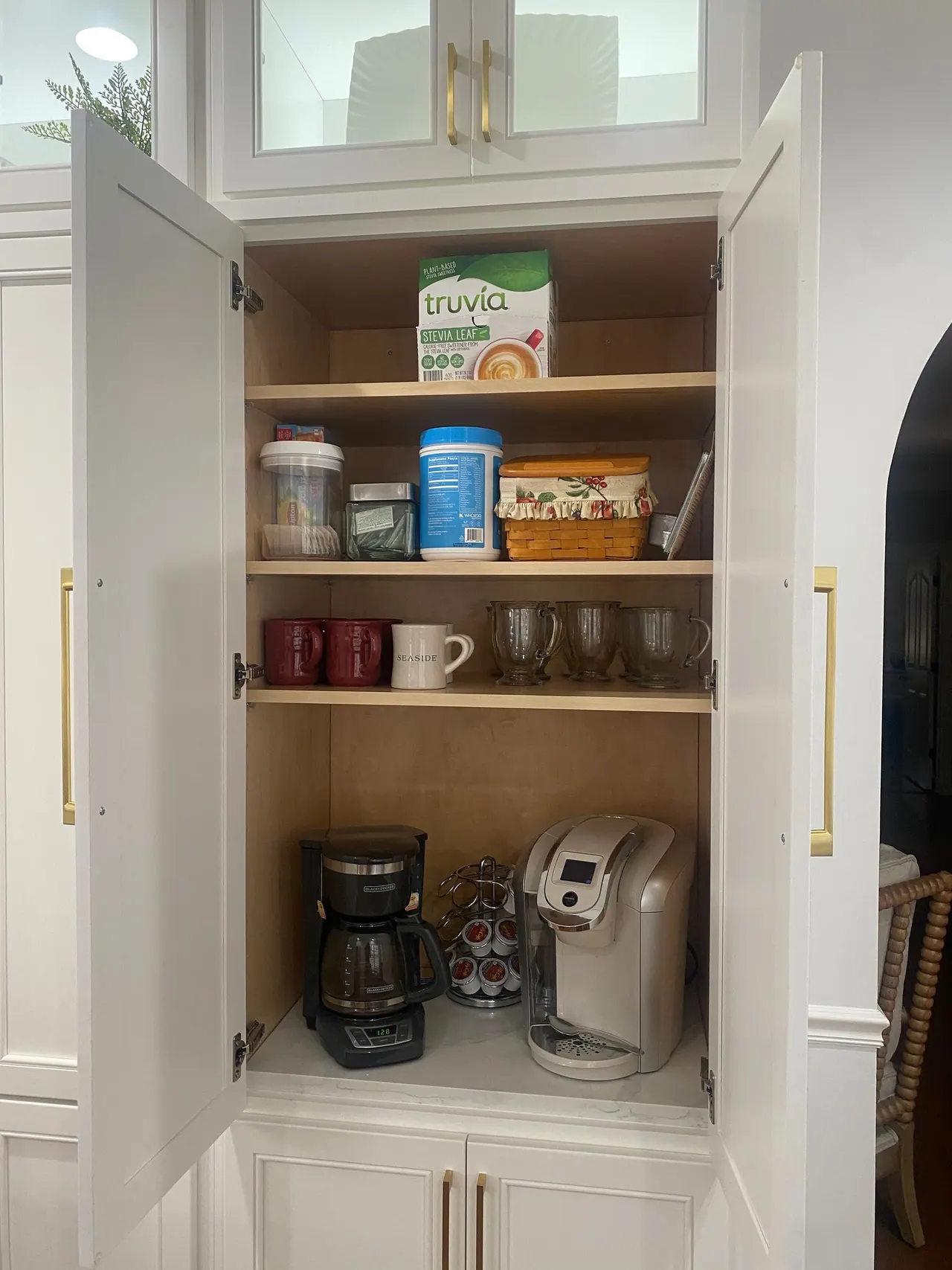 Coffee station cabinet with pull-out shelves
