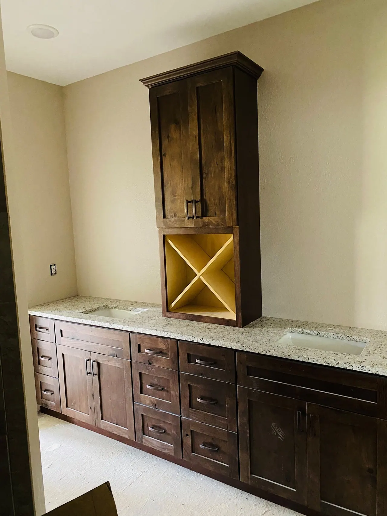Dark stained bar cabinet with wine storage