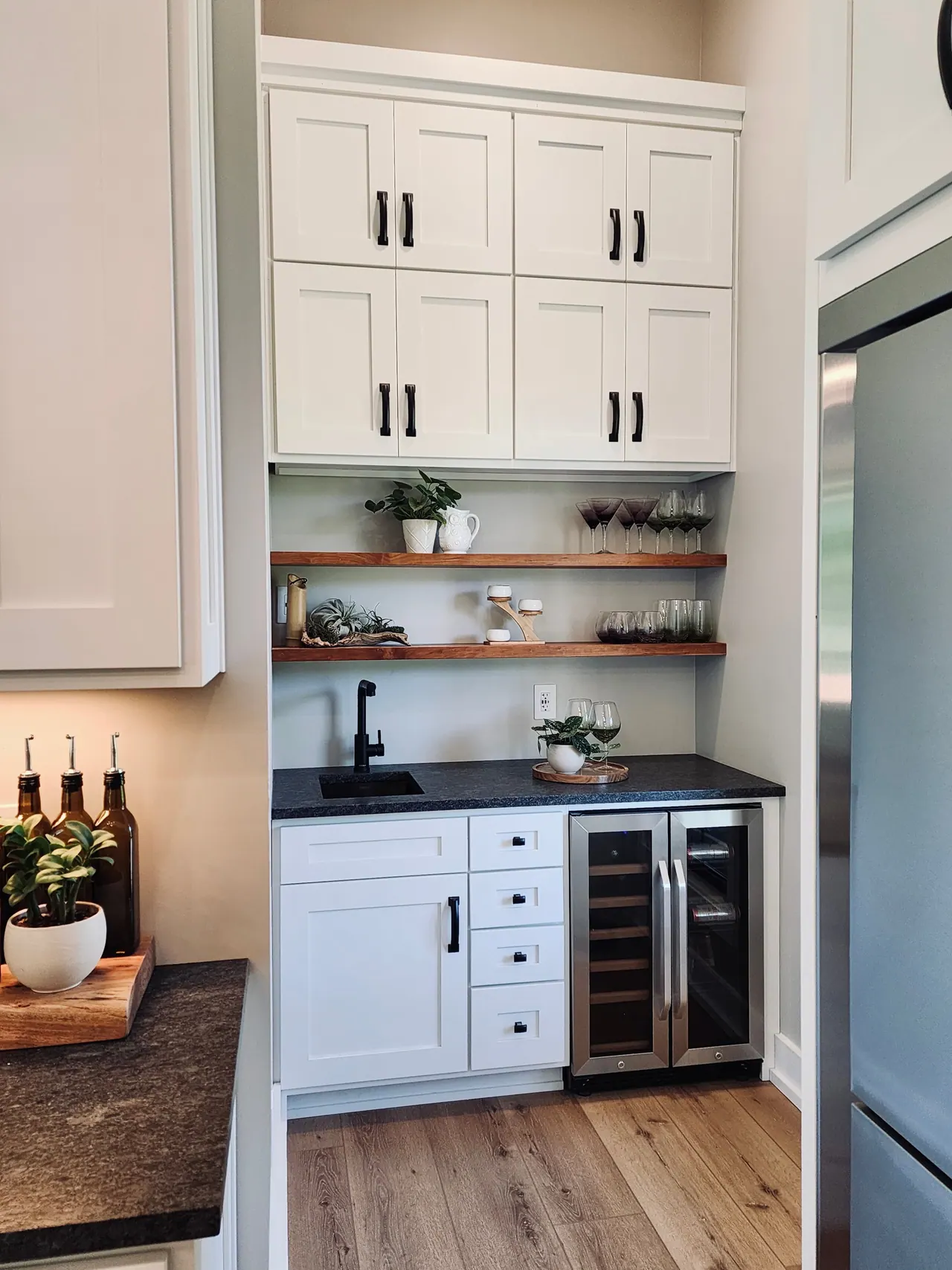 Beverage center with wine cooler and open shelves