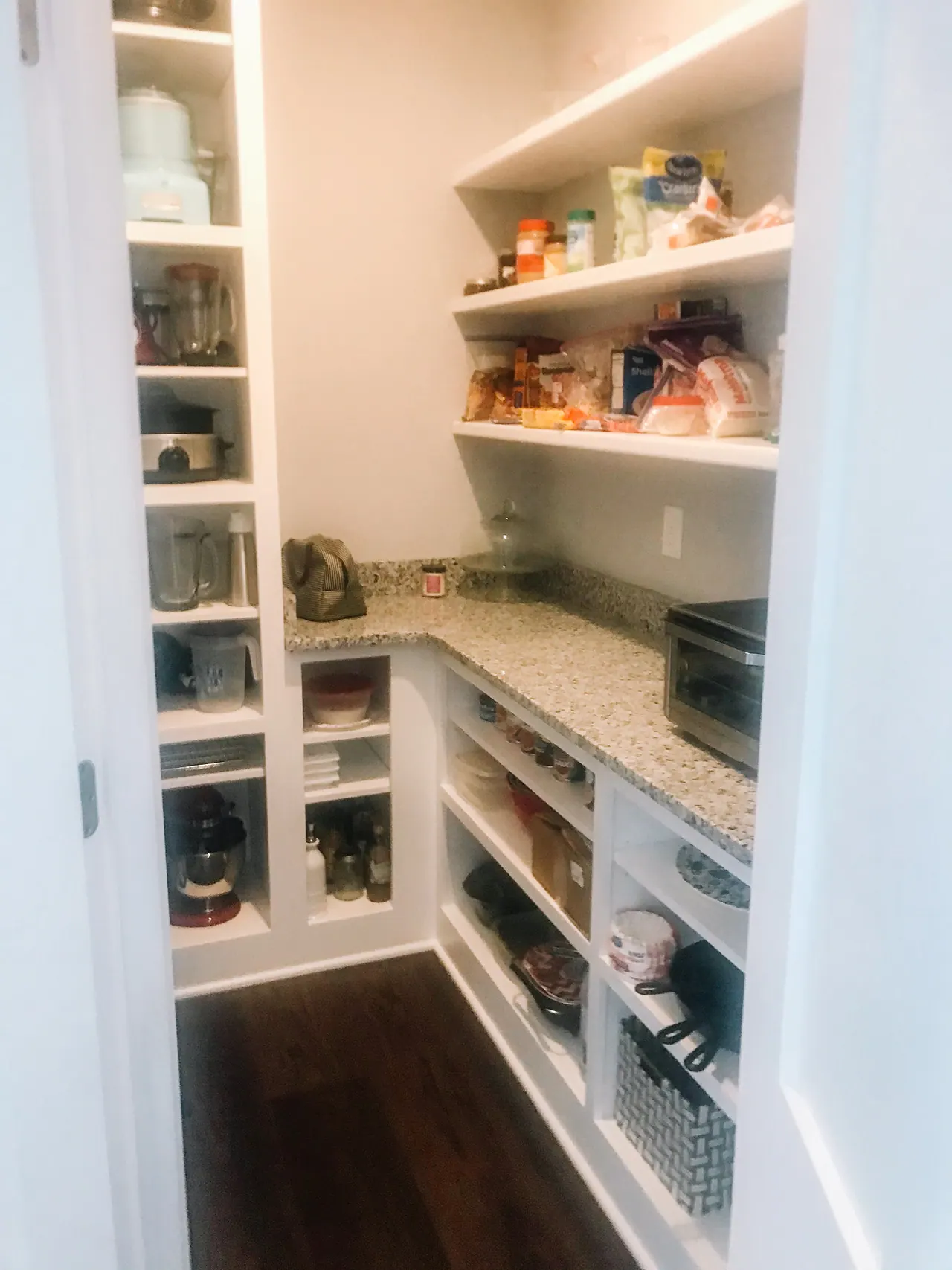 Pantry with open shelves and base drawers