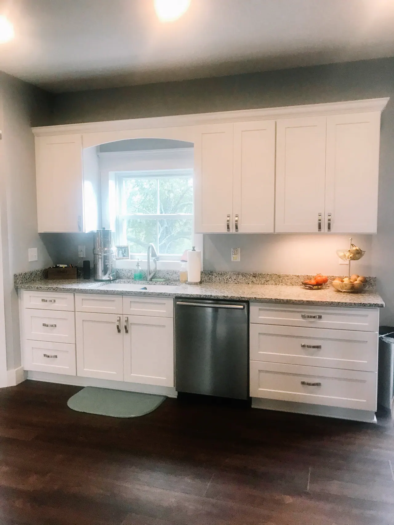White kitchen sink wall with window