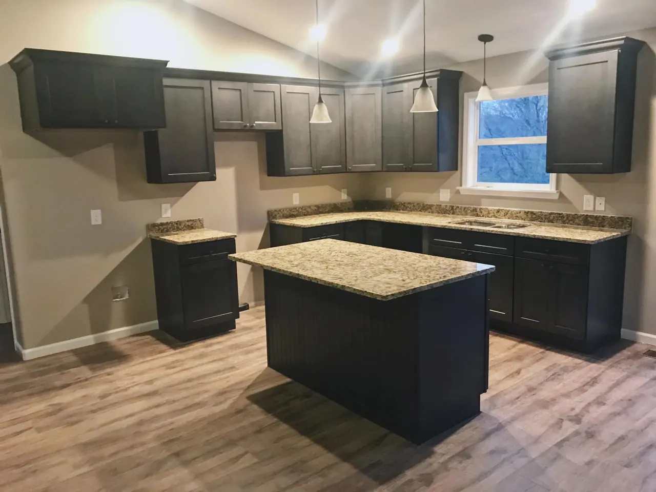 Dark gray kitchen with island