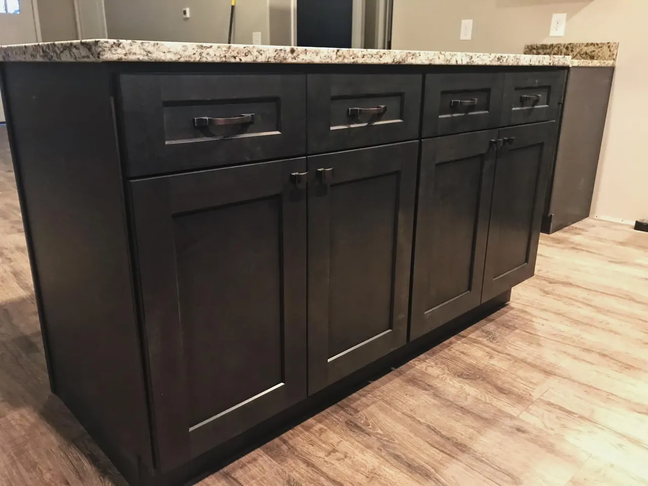 Charcoal shaker cabinets with granite
