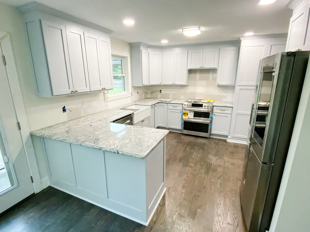 White kitchen corner with tall pantry