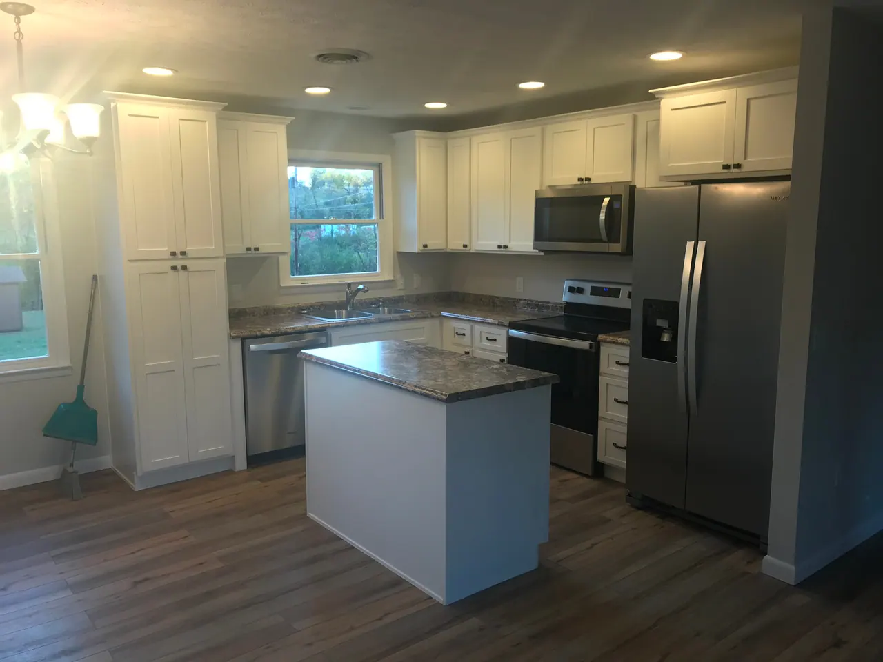 Bright white kitchen with center island